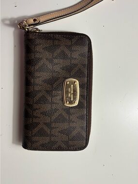 Michael Kors Jet Set Travel Continental Wallet in brown monogram logo print